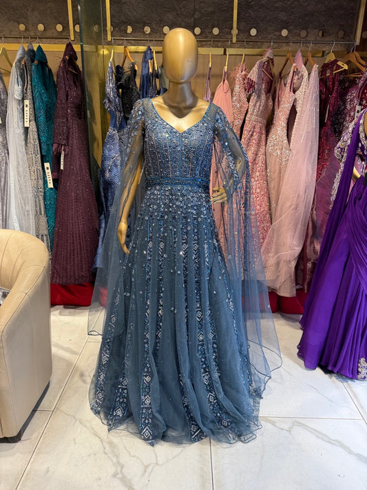 Blue embroidered gown on mannequin perfect for bridal showcases.