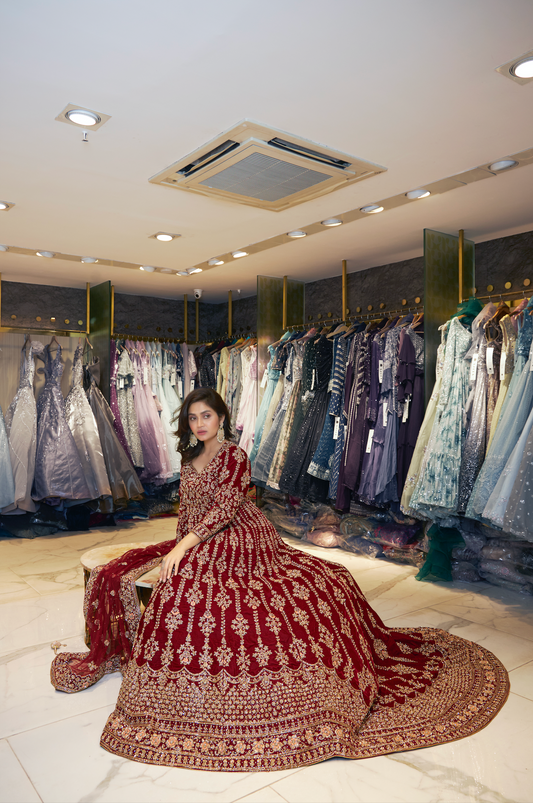 Red embroidered bridal lehenga perfect for wedding ceremonies.