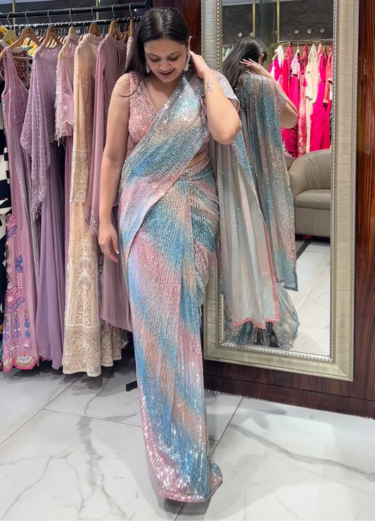 Celeste multicoloured drape pre-stitched saree with peach, blue, beige tones, sequinned fabric, and hand-embroidered blouse