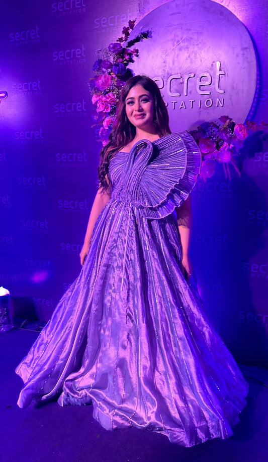 Purple gown posing ideal for cocktail parties and special events.