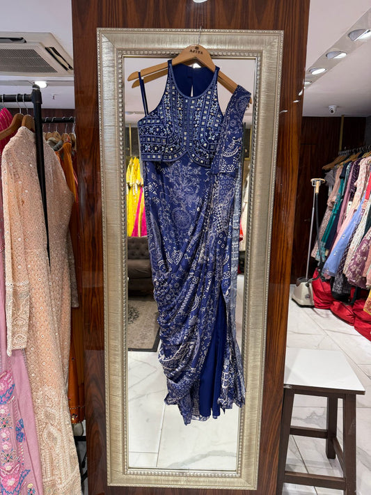 Pre-stitched slit saree paired with raw silk blouse. Front slit