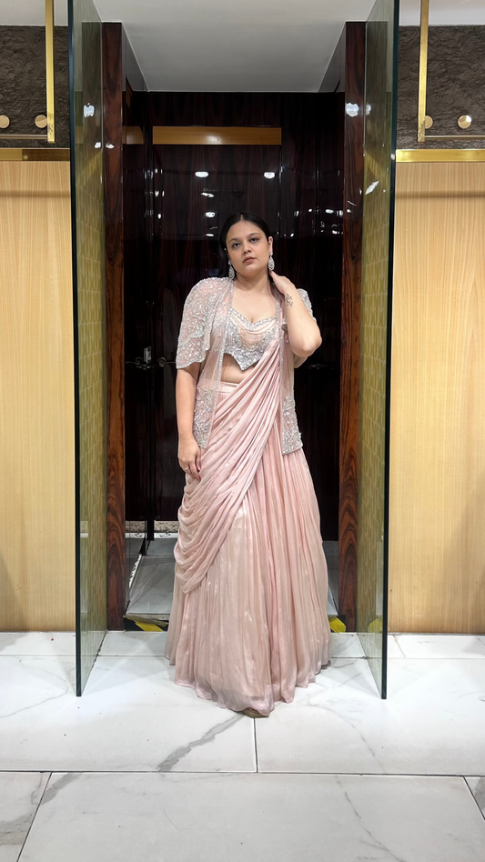 Kavya peach lehenga set with net jacket and attached drape