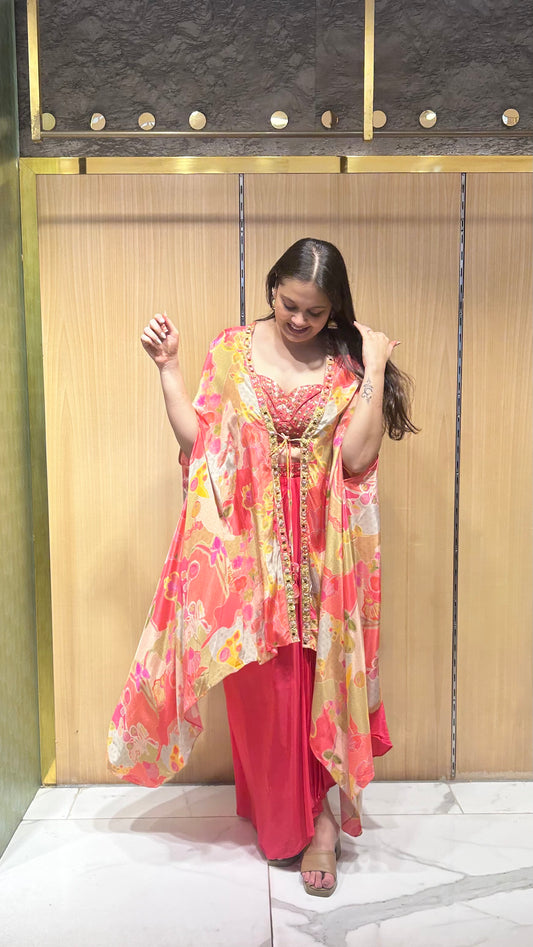 Pink floral cape set with flowing cape and contrast motifs – ideal for festive functions or engagement night.