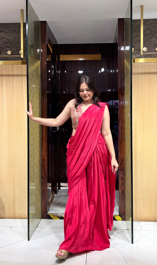 Pink draped outfit ideal for cocktail parties and evening wear.