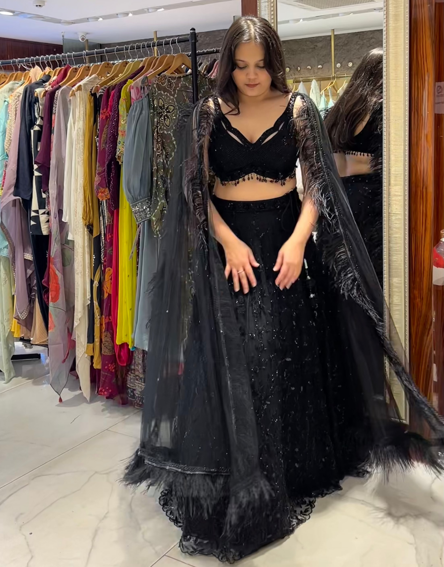 Naelle Lemon Yellow Chikankari Lehenga with Lucknowi embroidery, pearl and sequin details, and net dupatta with crystal hangings.