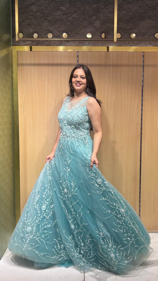 Embellished blue gown perfect for evening galas and receptions.