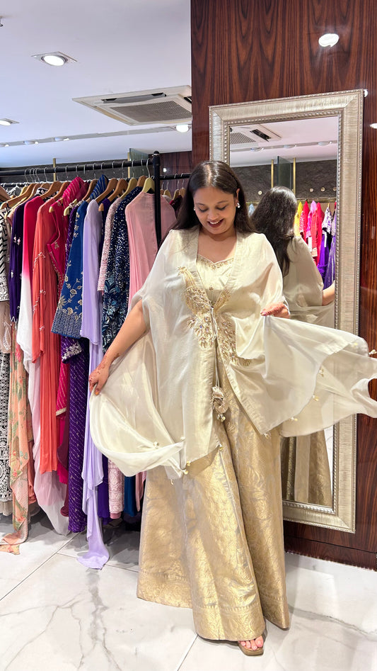 Vamika Champagne Tissue Sharara with Embroidered Cape