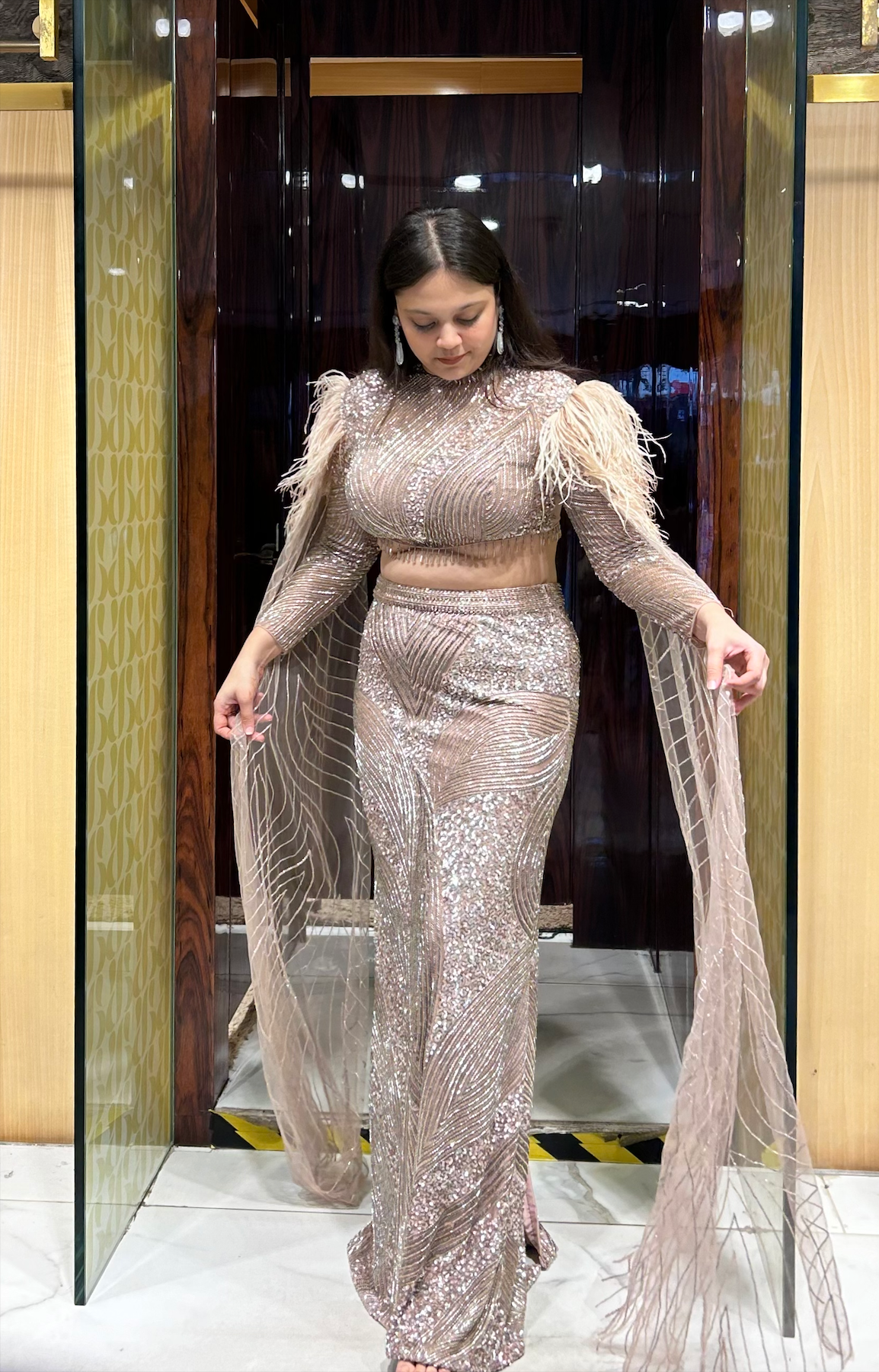 Bodycon luxury designer inspired outfit with feathers. Hand embroidered lehenga/ top and skirt set - Perfect for Sangeet, Ring ceremony, reception, etc