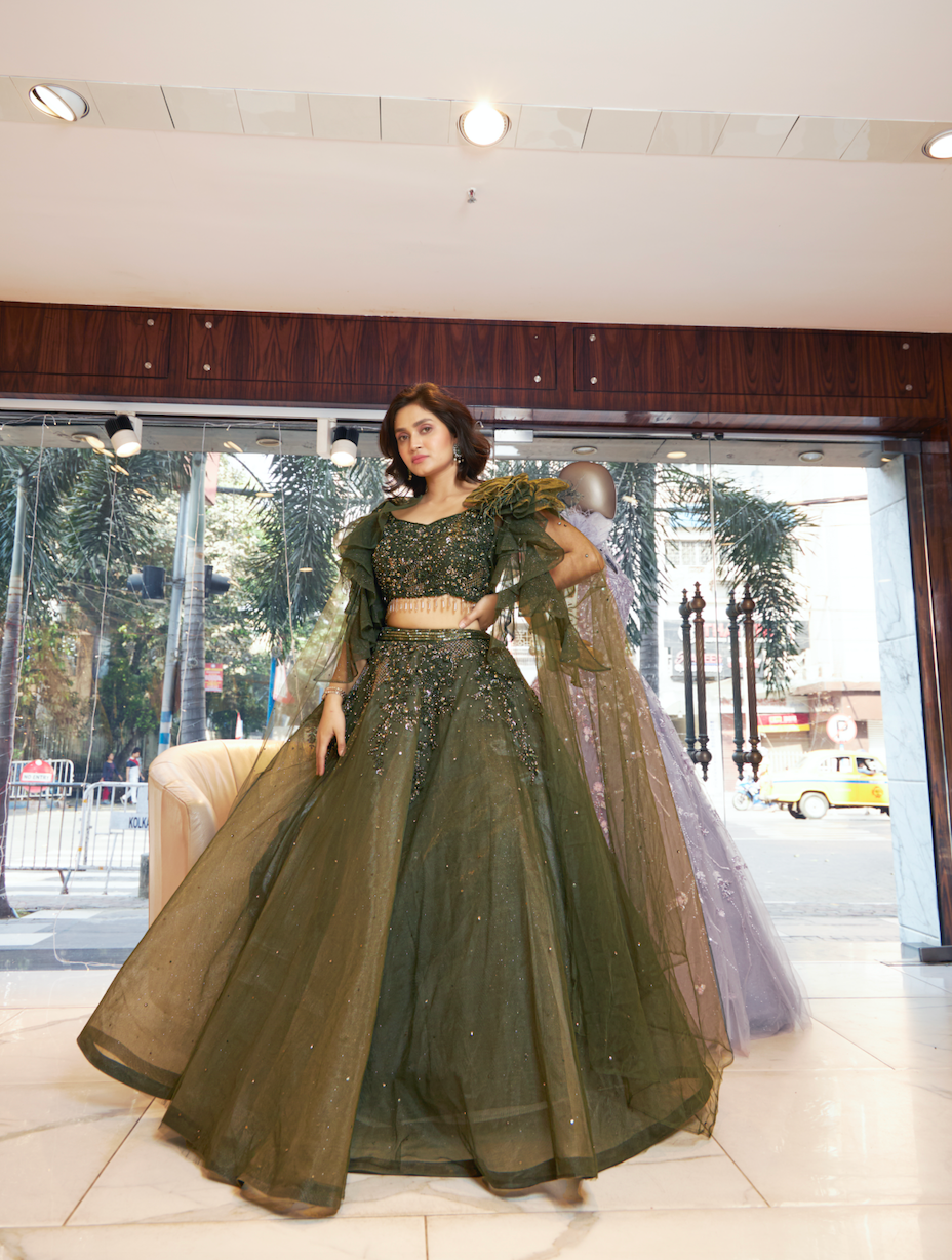 Olive lehenga set perfect for sangeet and traditional ceremonies.