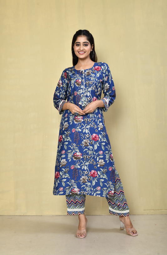 Blue floral printed kurta set with zigzag pants – ideal for casual gatherings or festive brunches.