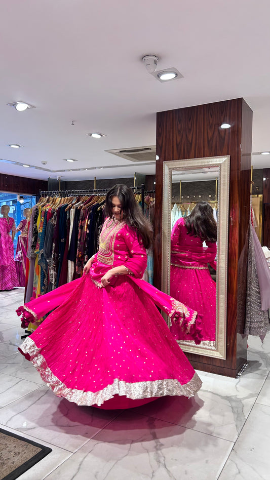 Pink lehenga twirling suited for sangeet and engagement events.