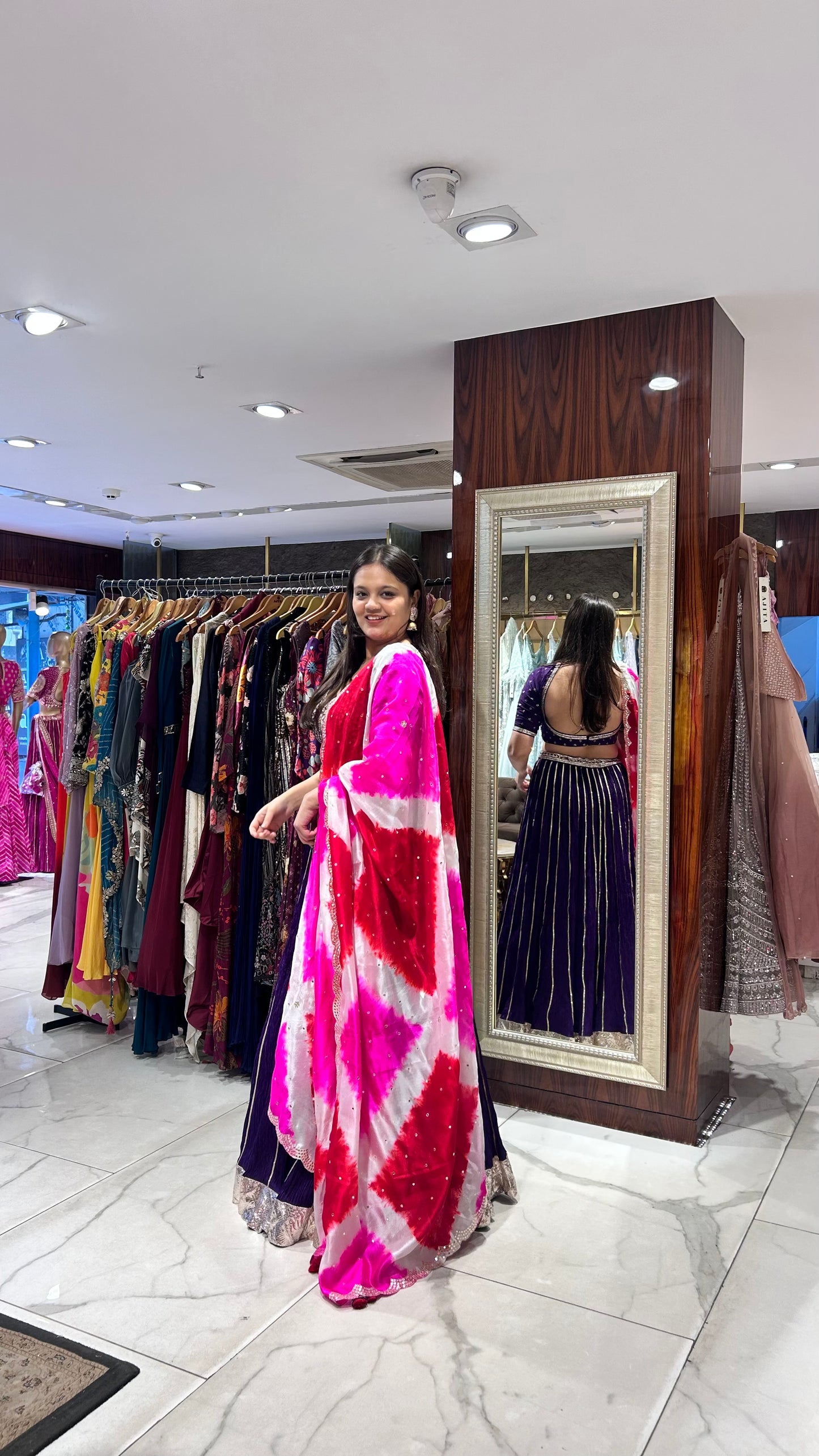 Multicolour organza dupatta with a traditional lehenga – festive wear