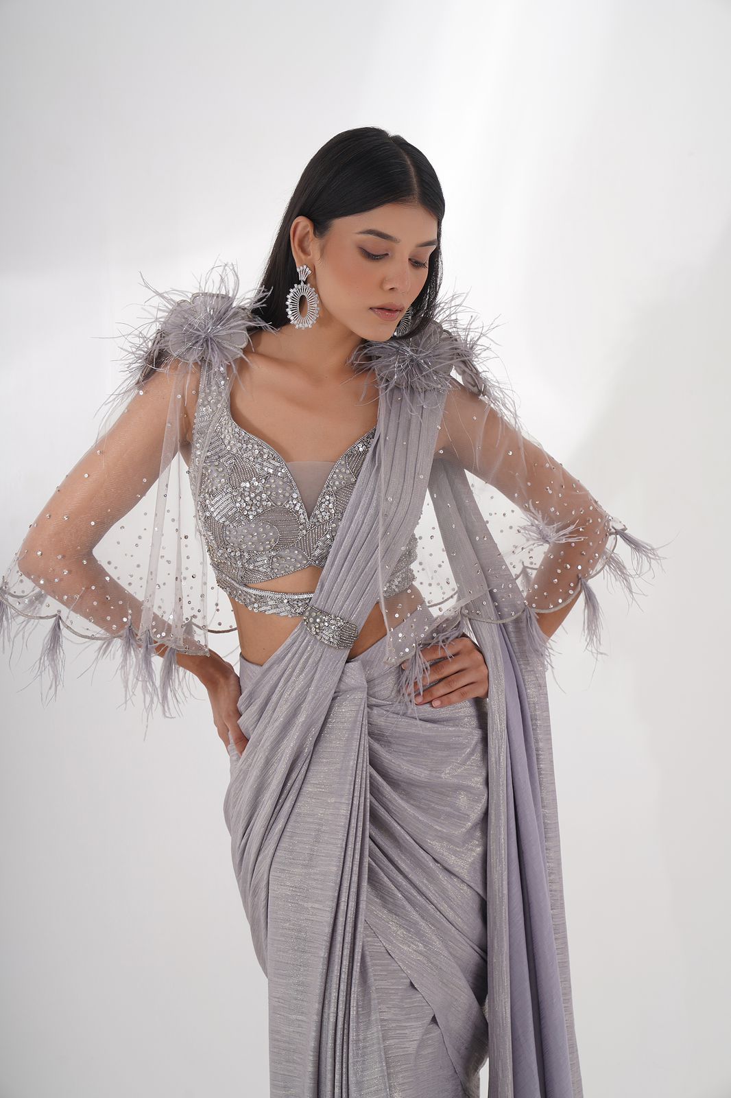 Peach pink semi-bridal lehenga with pearl embroidery and scalloped blouse – perfect for sangeet, engagement.