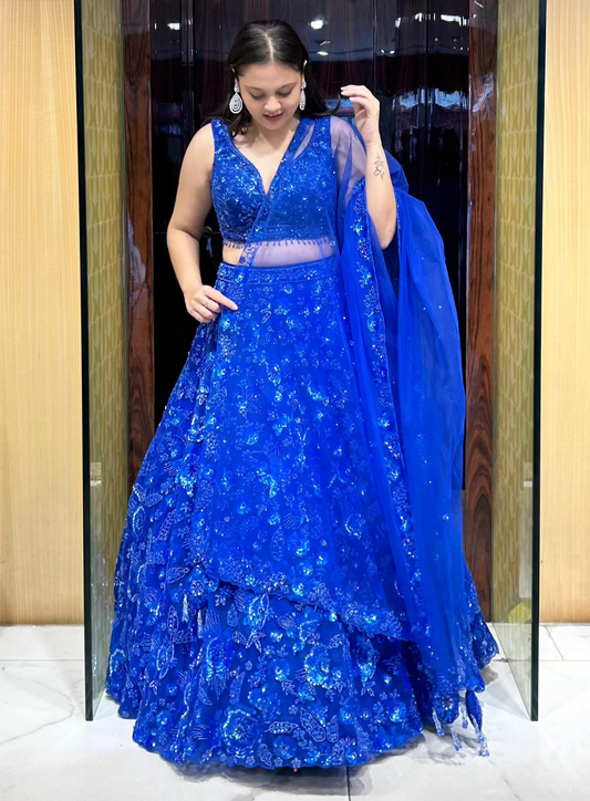 Royal blue semi-bridal lehenga with hand embroidery for bride's sangeet, cocktail, reception