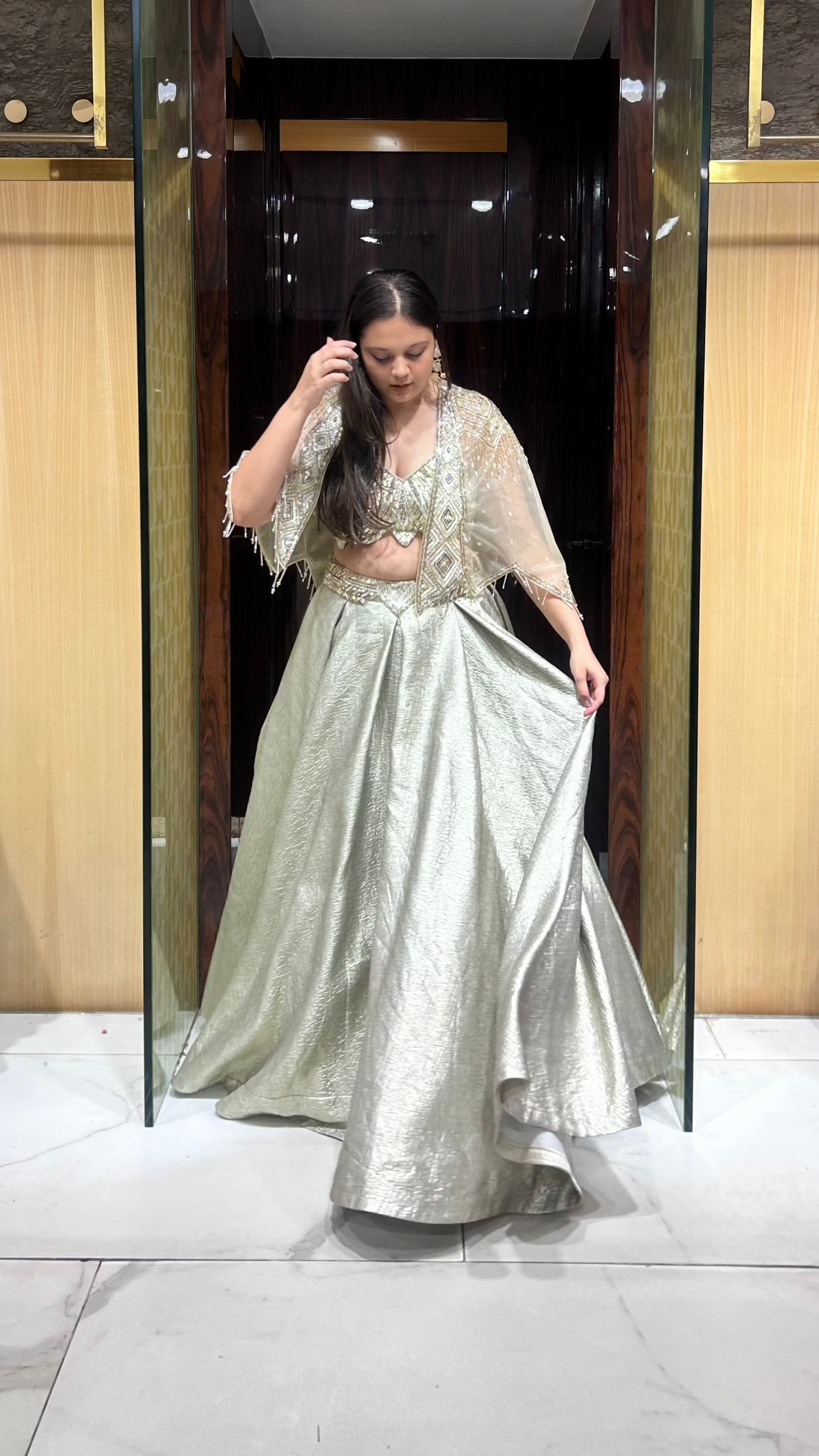 Cocktail-ready lehenga set in sheen grey and gold tones