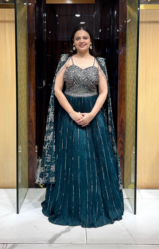 Karisma bottle green gown with cape – front view for cocktails