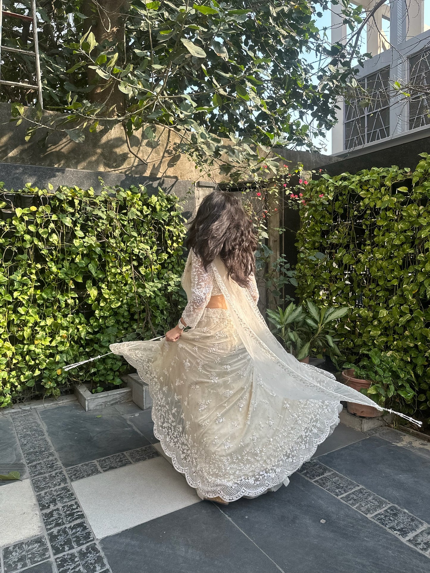 Amishi Ivory Hand Embroidered Net Lehenga