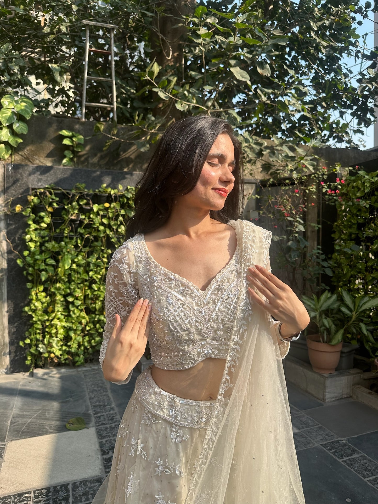 Amishi Ivory Hand Embroidered Net Lehenga