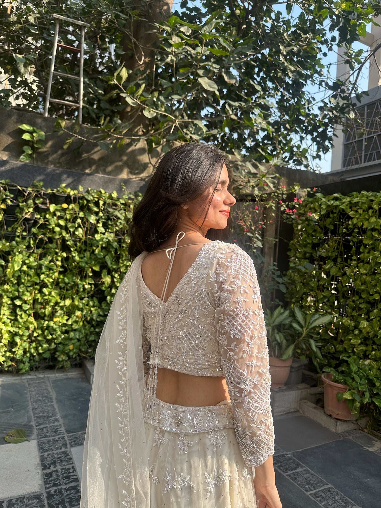 Amishi Ivory Hand Embroidered Net Lehenga