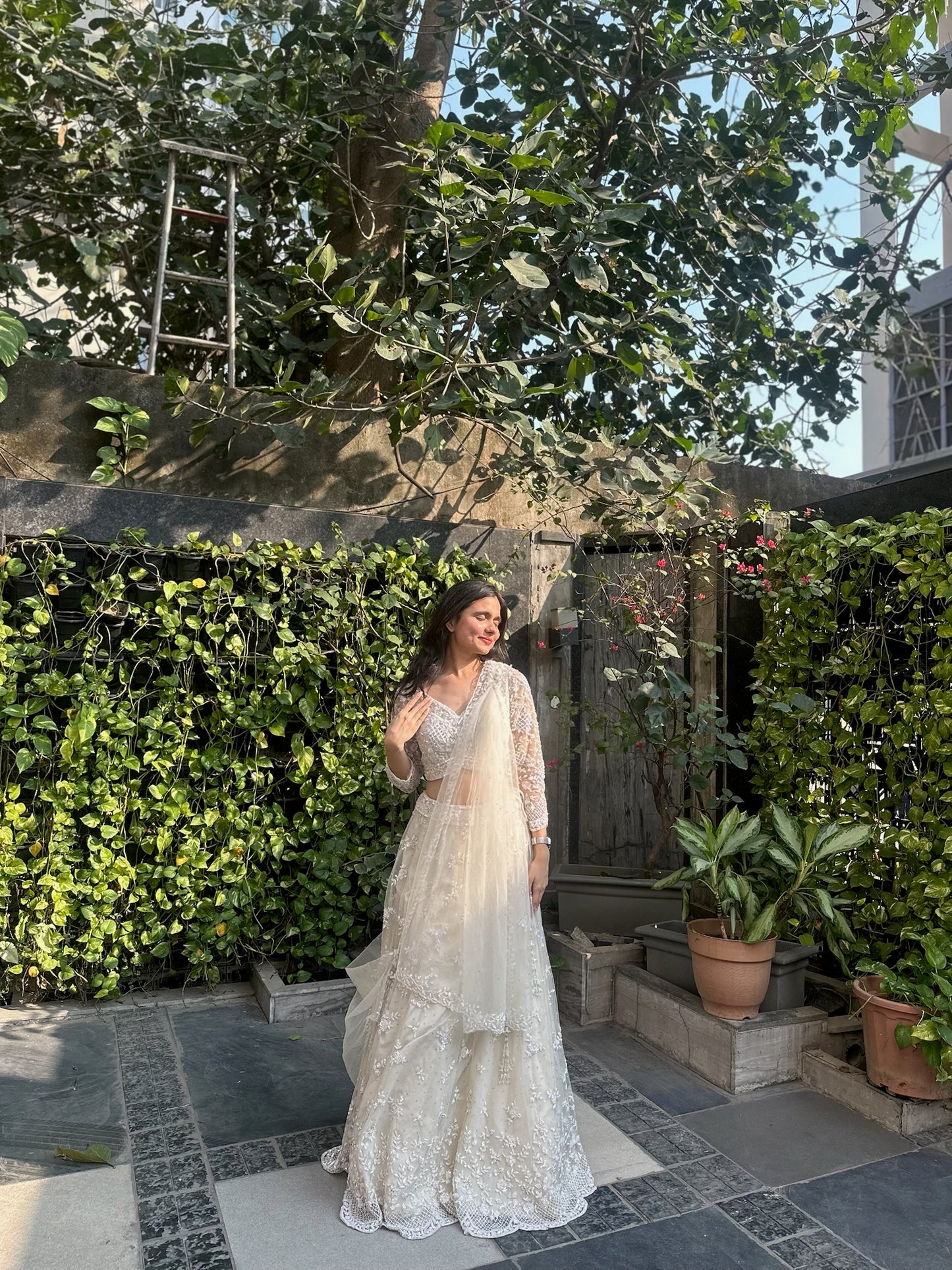 Amishi Ivory Hand Embroidered Net Lehenga