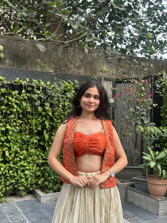 Avni Cream Rust Leheriya Jacket Lehenga Set