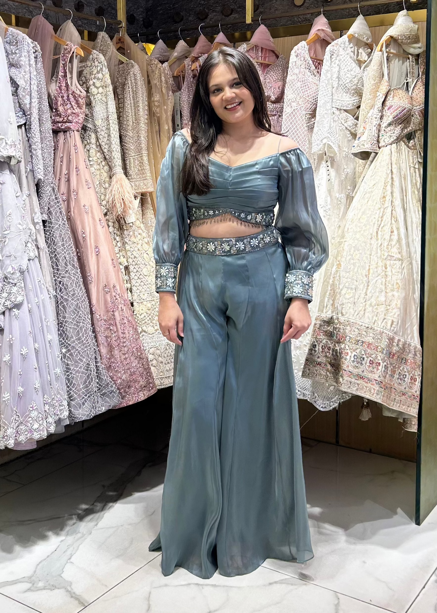 Greyish green Anara organza set with off-shoulder sleeves and pearl embroidery – ideal for cocktails and bridesmaids.