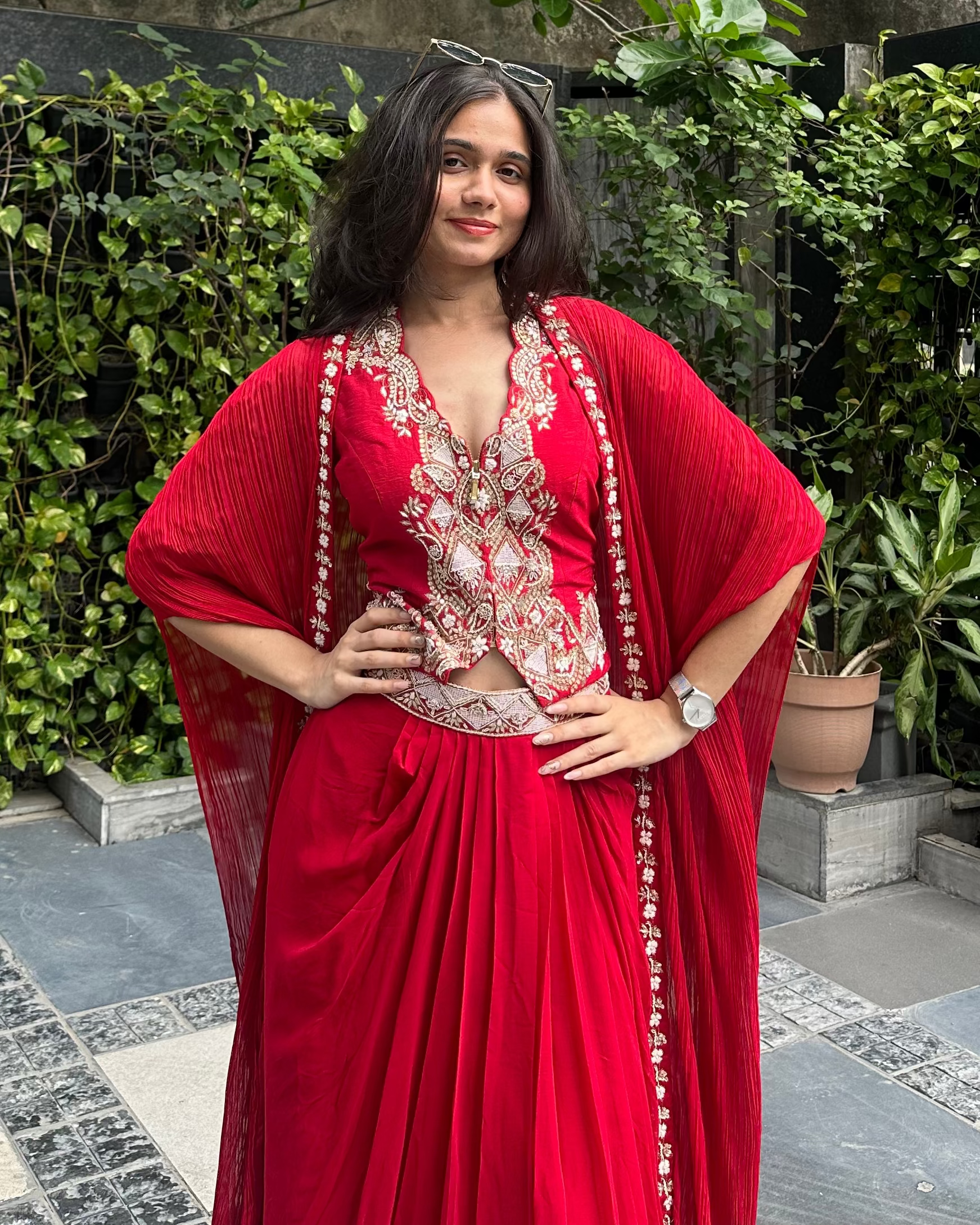 Red Indo-western cape and pleated skirt set with zardosi embroidered jacket top for wedding and cocktail events – Trish
