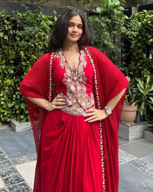Red Indo-western cape and pleated skirt set with zardosi embroidered jacket top for wedding and cocktail events – Trish