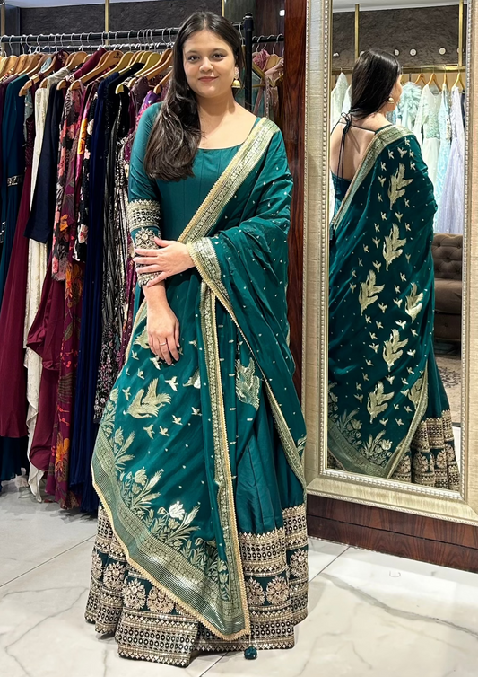 Embroidered green Anarkali suit perfect for festive celebrations.