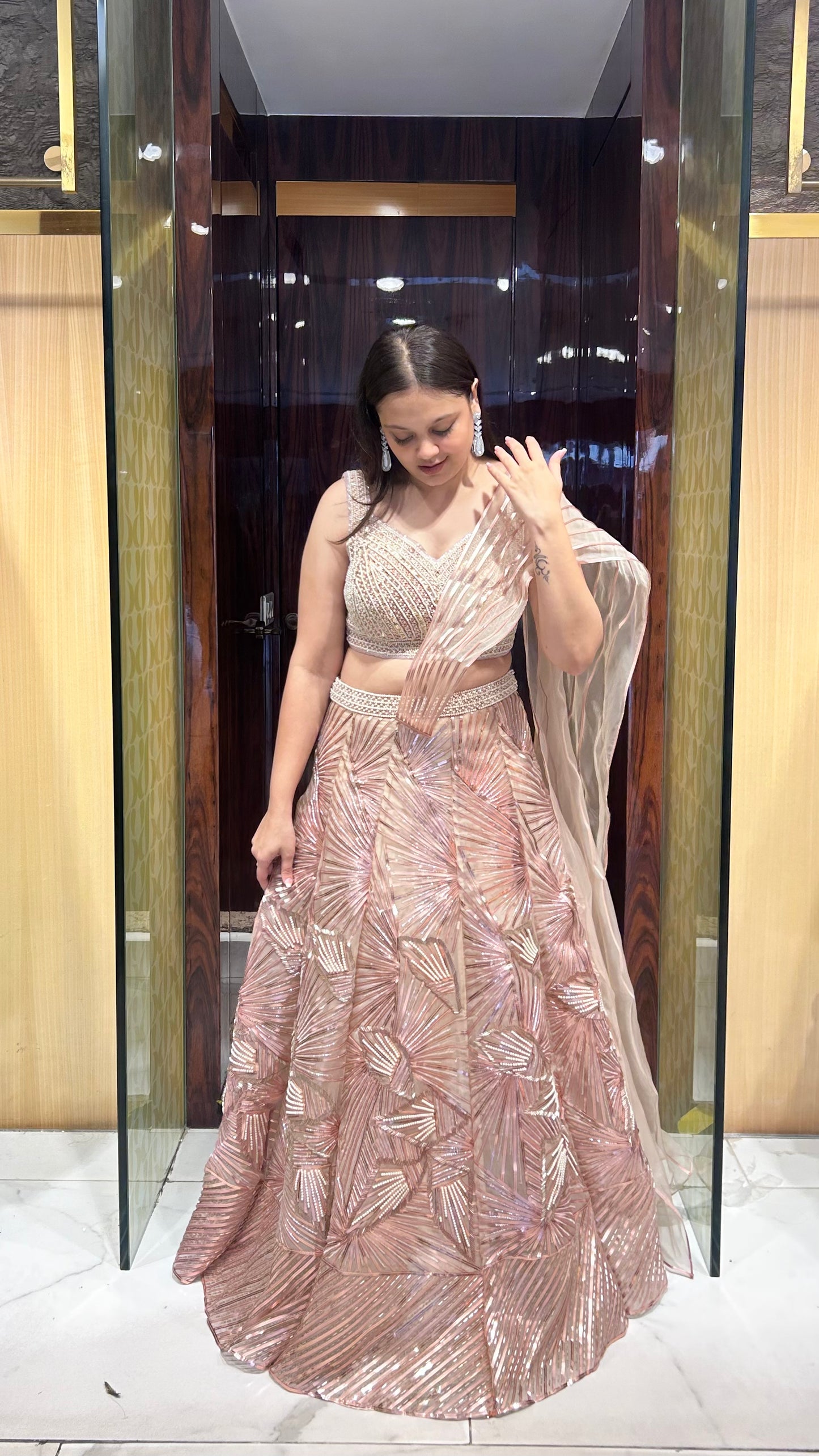 Hand-embroidered lehenga with pearl and cut dana work