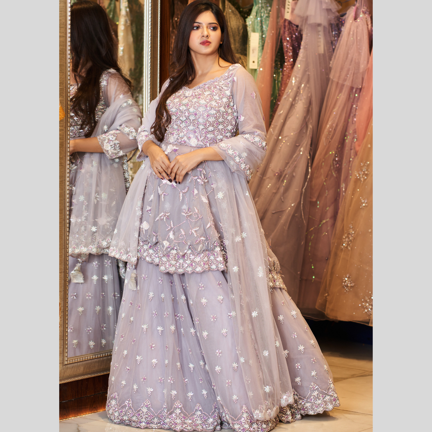 Nikaah Nikah ready with this peplum hand embroidered designer inspired lehenga lavender. 