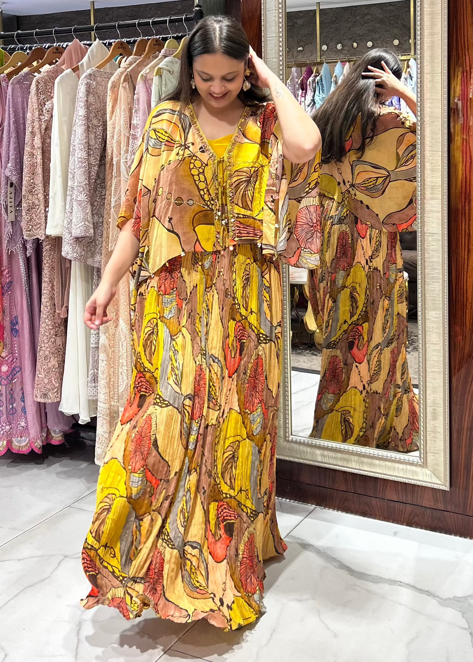 House of Ajita Tanira mustard cape set with printed skirt and satin bustier