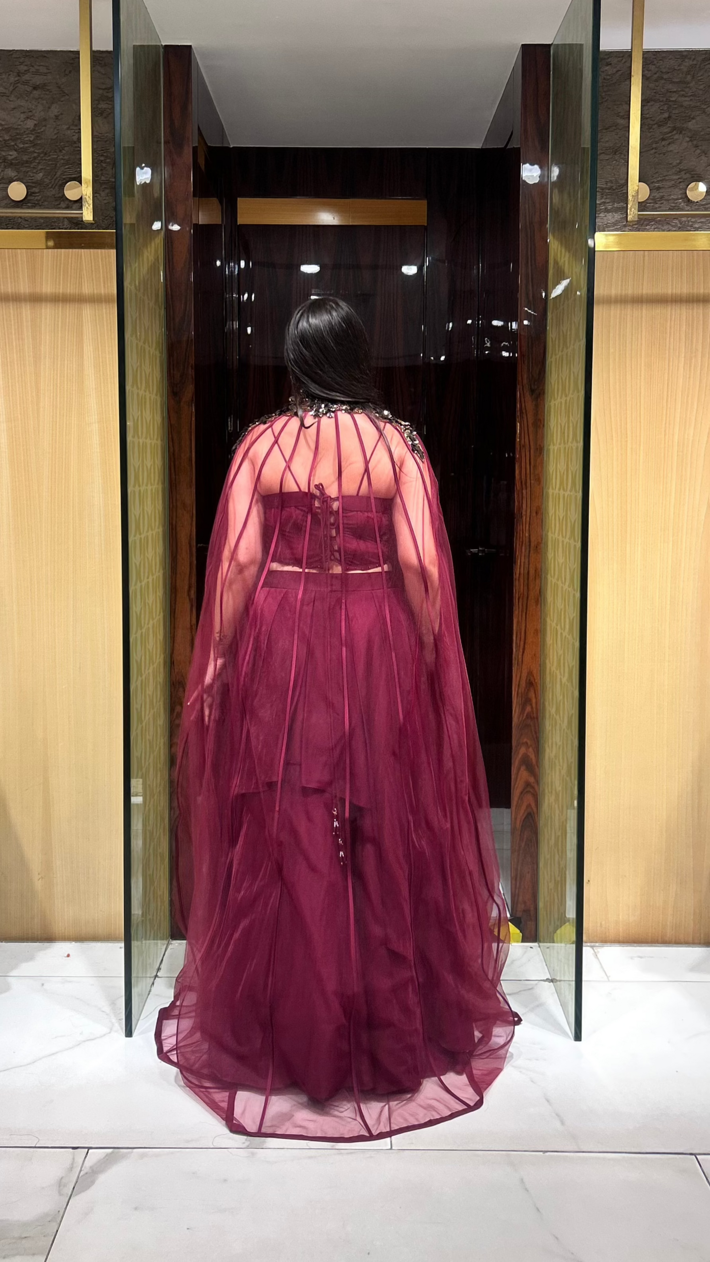 Crystal ball work corset blouse with neck-attached cape